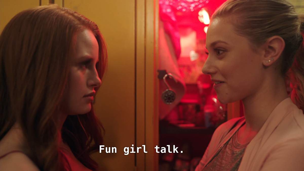 Cheryl and Betty face off by a locker. Betty: Fun girl talk.