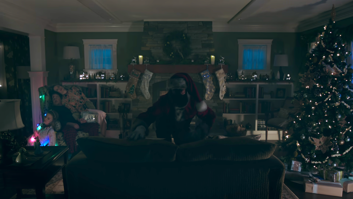 During a dream sequence, the Black Hood climbs over the couch.