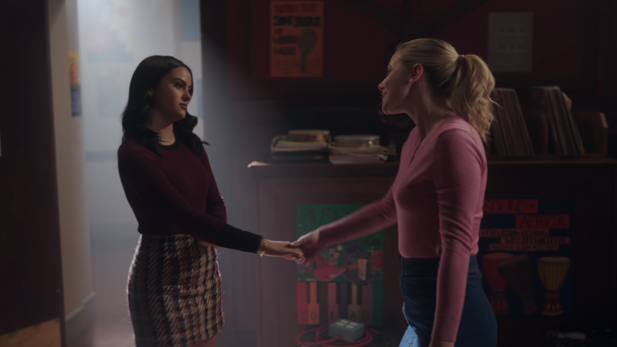 Veronica and Betty hold hands during a musical number