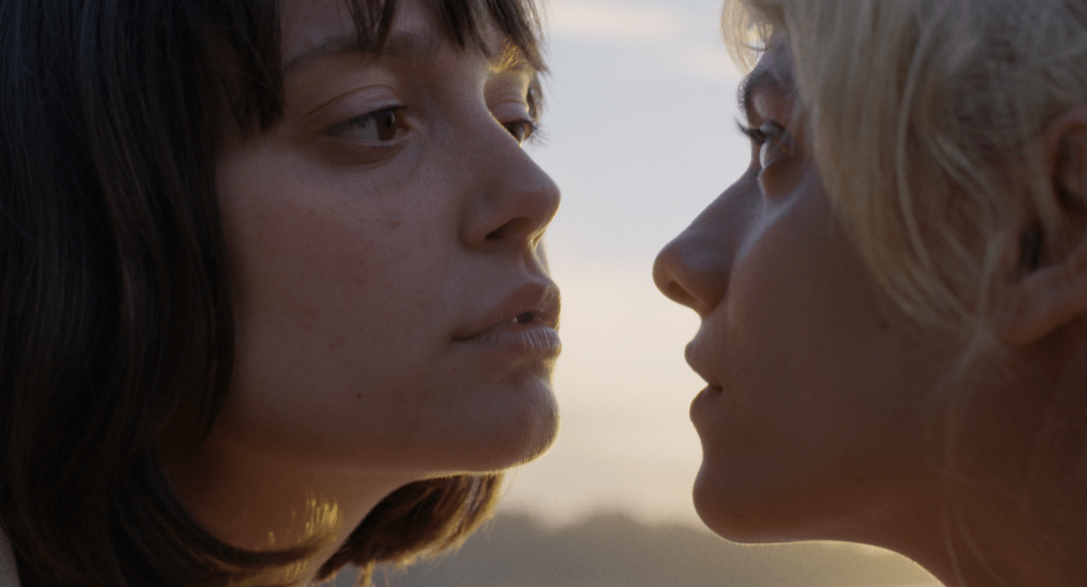 Close up of two women looking at each other