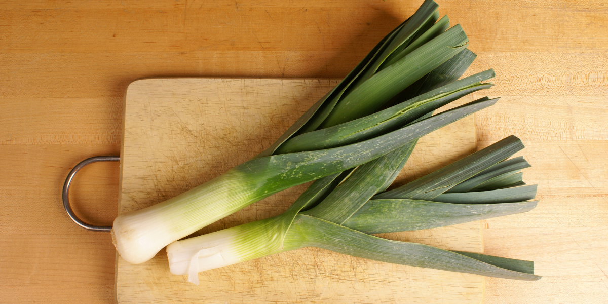 leeks on a cutting board