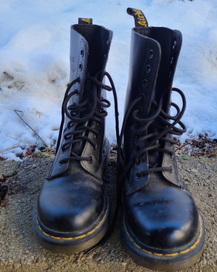 a pair of black doc marten's