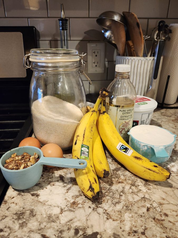 ingredients for banana bread, on a counter