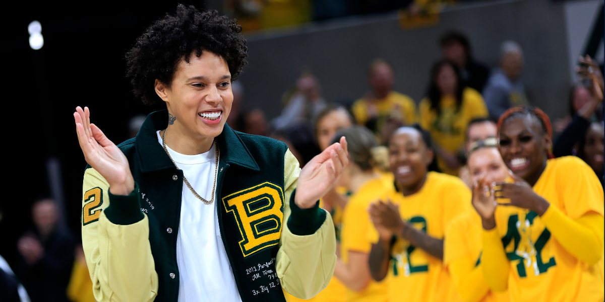 Brittney Griner reacts with a smile as her jersey is retired at Baylor University. Photo by Ron Jenkins/Getty Images)