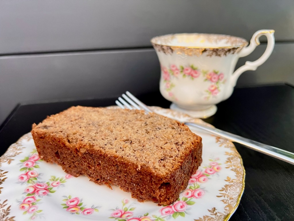 a slice of banana bread and tea