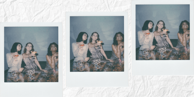 polaroid of three women drinking together