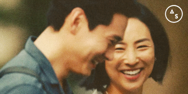 A grainy edit of Greta Lee and Teo Yoo laughing in Past Lives.
