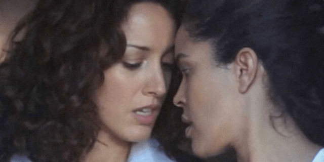 Cheating Is Not Abuse: Bette and Candace almost kiss in close up from season one of The L Word