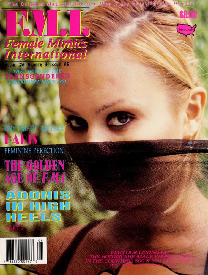 F.M.I. Female Mimics International Magazine Cover, The Golden Age of FMI, a close up of a trans woman with smoky eye makeup covering the lower half of her face with shear black fabric
