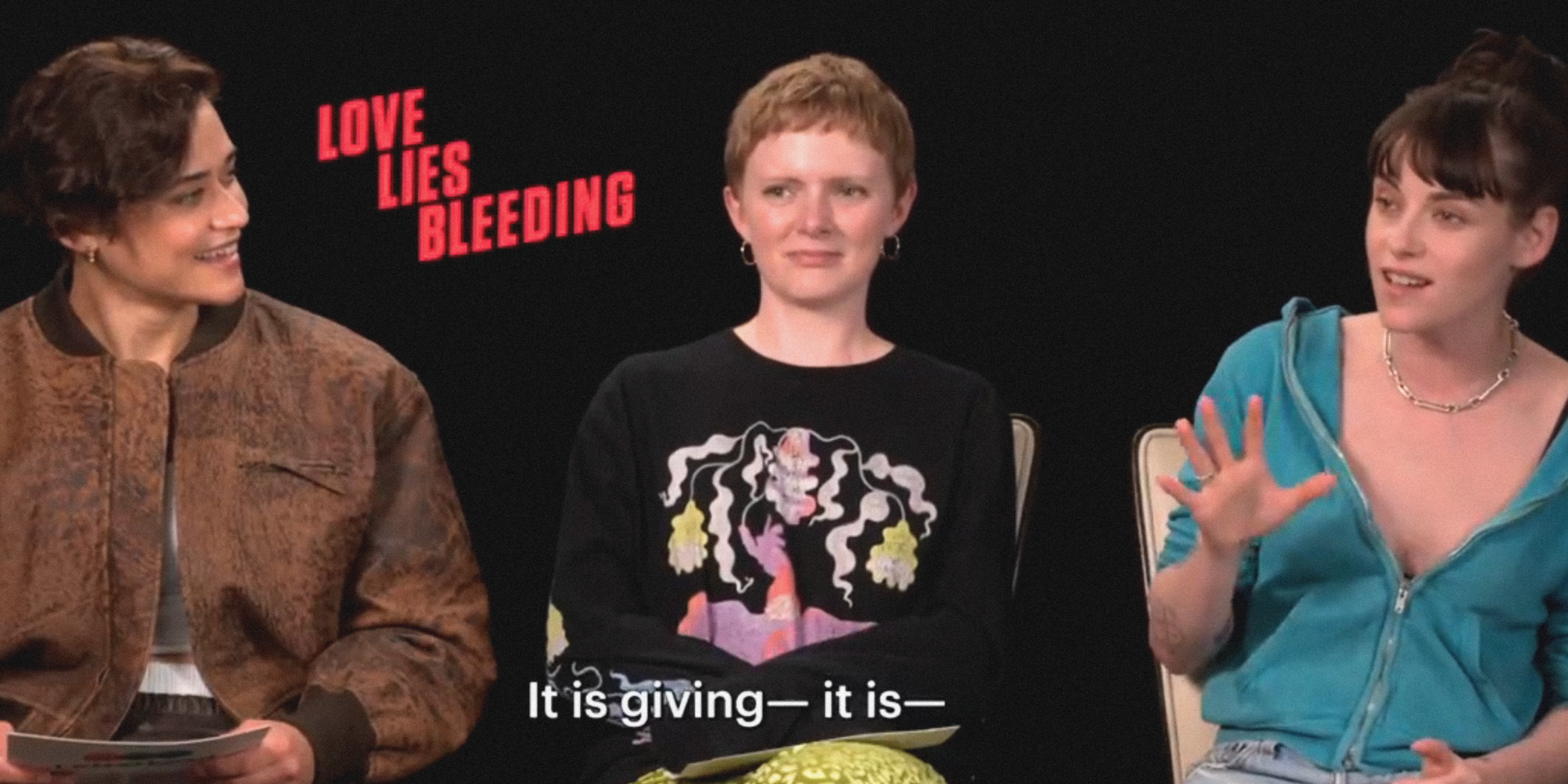 A screenshot of Katy O'Brian, Rose Glass, and Kristen Stewart being interviewed by Letterboxd. The subtitle says "It is giving— it is—"