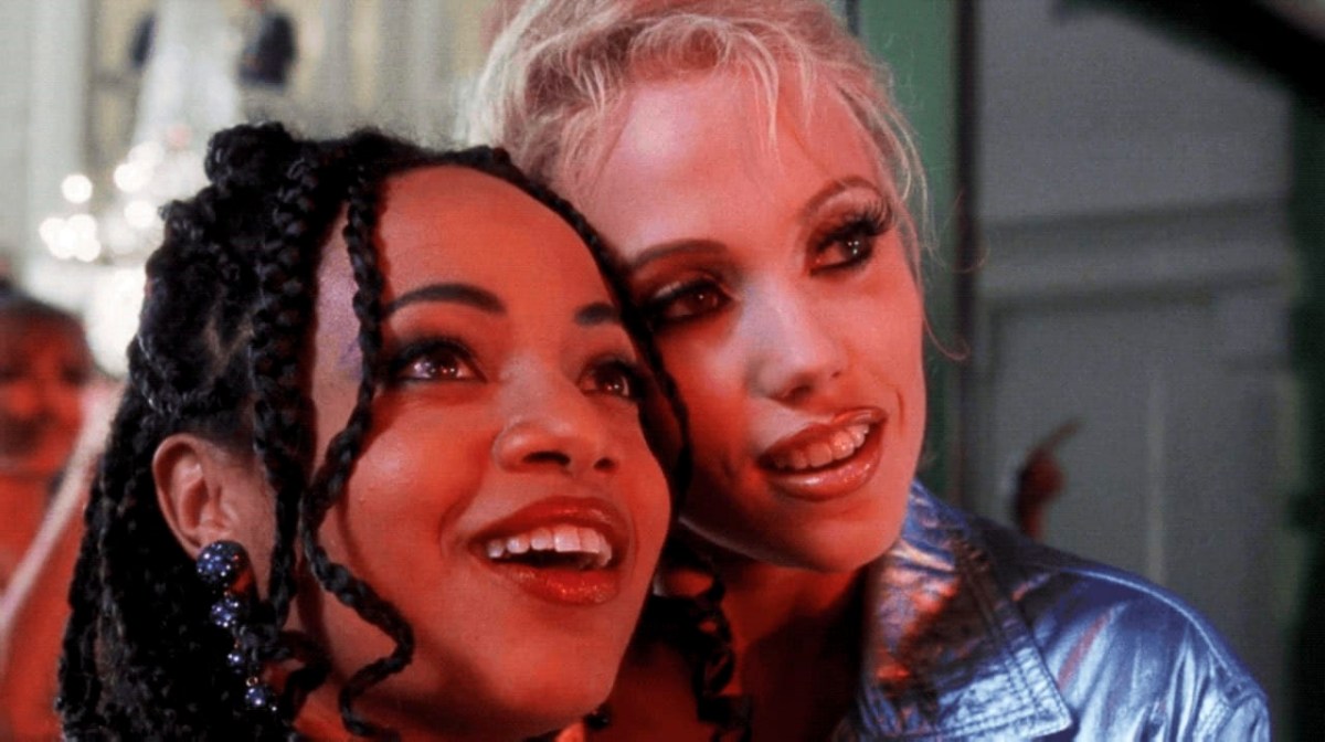 A close up of Elizabeth Berkley and Gina Rivera in Showgirls