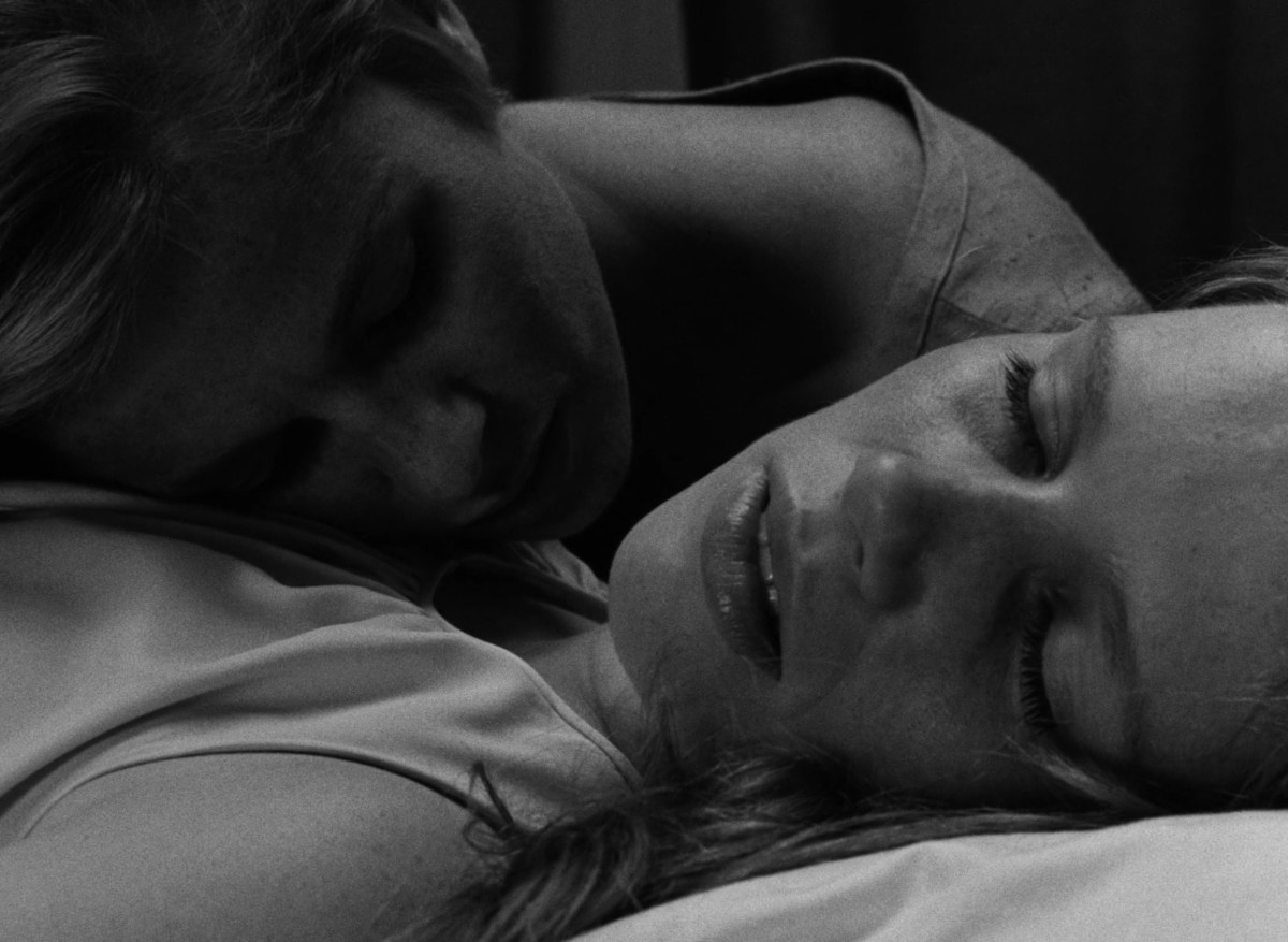 Image from Persona for 2000s movies girls kissing article joke. Bibi Andersson lays her head on Liv Ullman.