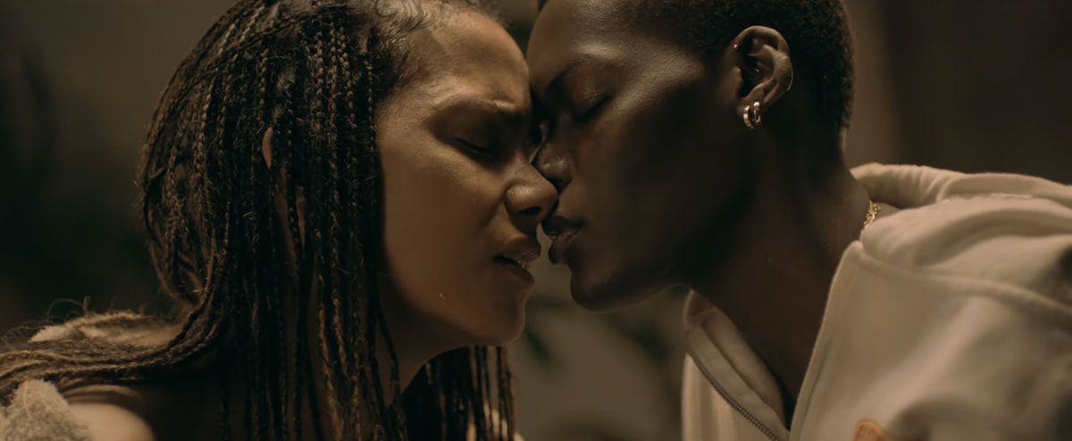 Halle Berry and Sheila Atim gaze at each other in Bruised.