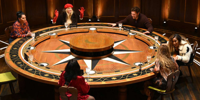The Traitors 211 cast members sit around a round table