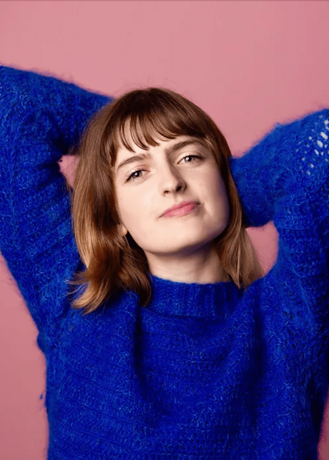 Chloe Troast in a blue sweater