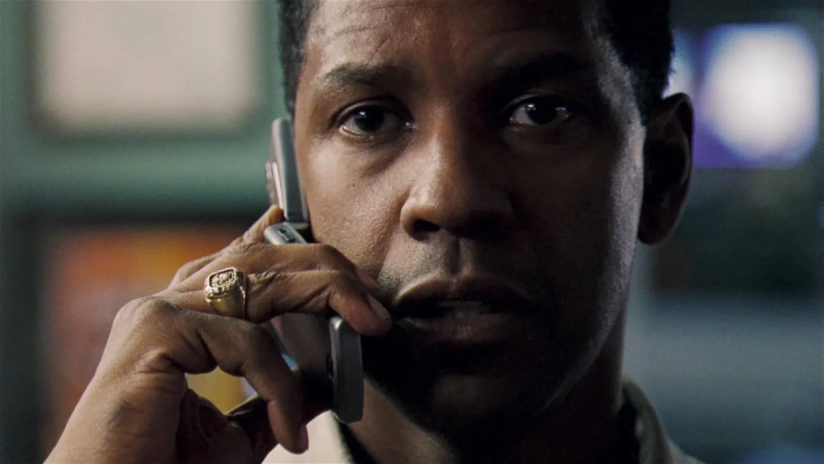 Movies to watch high: a close up of Denzel Washington on the phone.