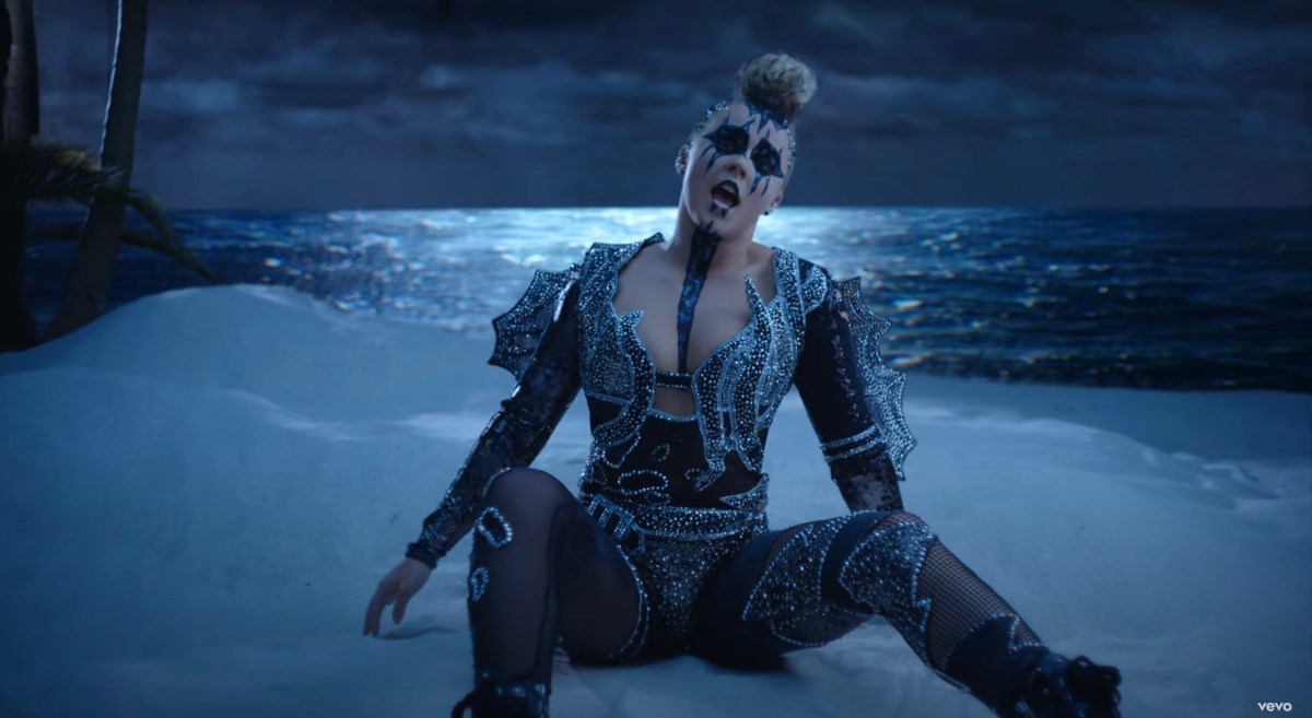 JoJo Siwa on the shore looking extra