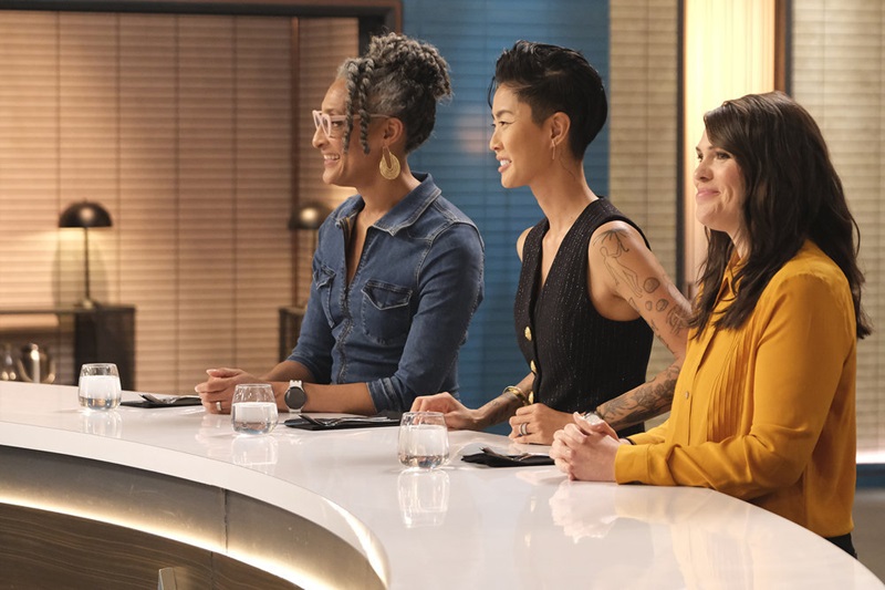Pictured: (l-r) Carla Hall, Kristen Kish, Clea Duvall; They're standing at judge's table during the quickfire challenge.