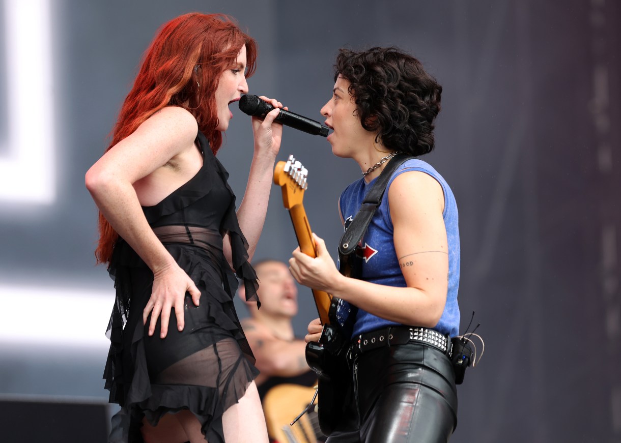 EADING, ENGLAND - AUGUST 27: Katie Gavin and Josette Maskin of MUNA perform live on the main stage during day three of Reading Festival 2023 at Richfield Avenue on August 27, 2023 in Reading, England.