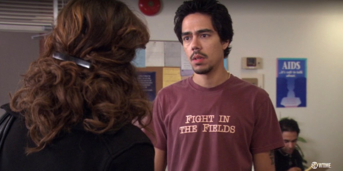 oscar in a a "fight in the fields" t-shirt