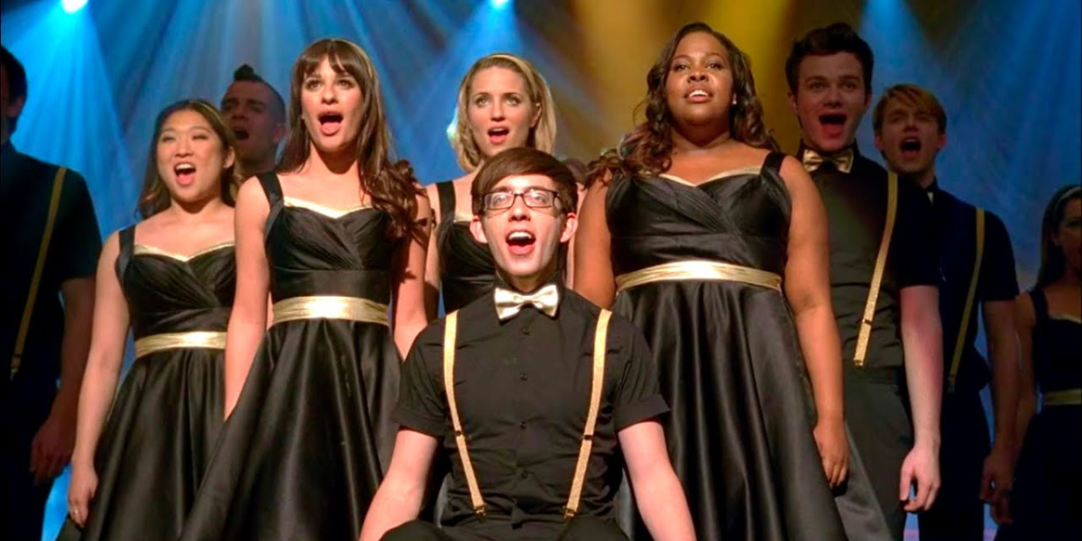 36 Songs Glee Would Cover Now: The New Directions dressed in black sing on stage