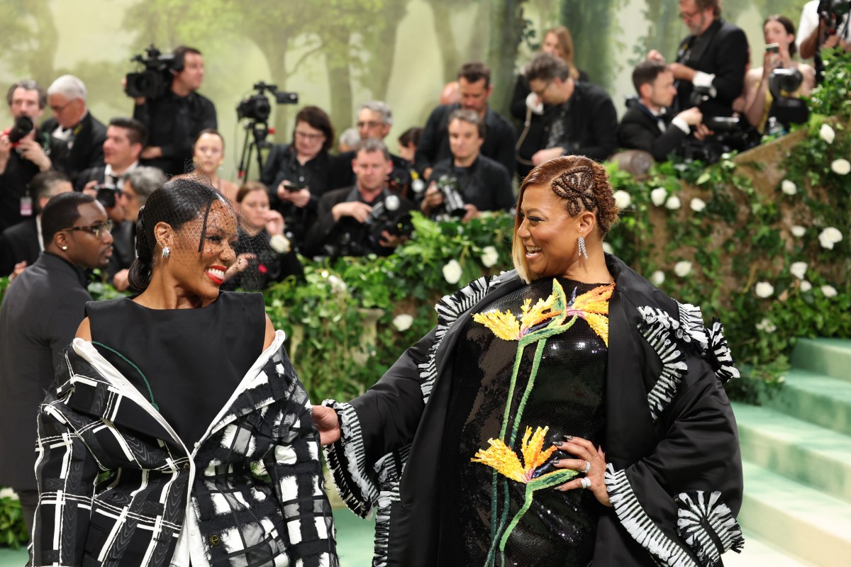 NEW YORK, NEW YORK - MAY 06: (L-R) Eboni Nichols and Queen Latifah attends The 2024 Met Gala Celebrating "Sleeping Beauties: Reawakening Fashion" at The Metropolitan Museum of Art on May 06, 2024 in New York City. 