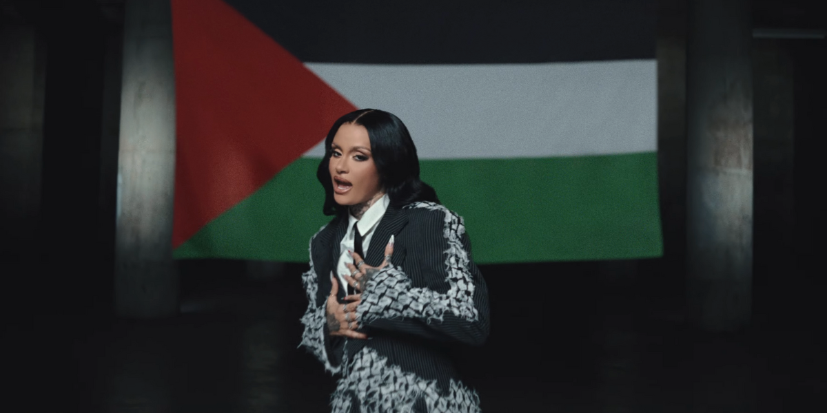 Kehlani in front of a Palestinian flag