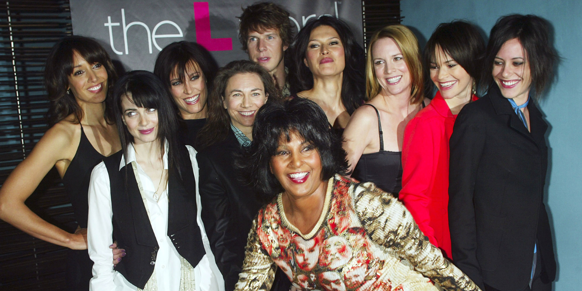 Cast members Jennifer Beals, Pam Grier, Erin Daniels, Leisha Hailey, Laurel Holloman, Mia Kirshner, Karina Lombard, Eric Mabius, Katherine Moennig and Executive Producer Ilene Chaiken at a preview luncheon for Showtime's new original series "The L Word" at Blue Fin October 23, 2003 in New York City. (Photo by Scott Gries/Getty Images)