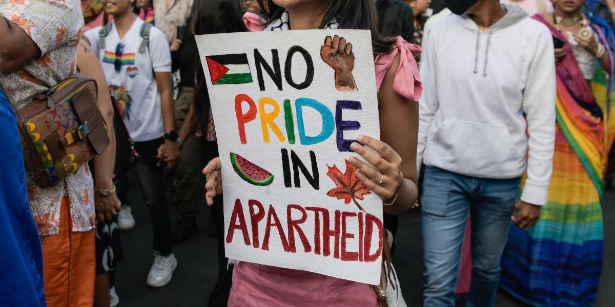 sign that says NO PRIDE IN APARTHEID