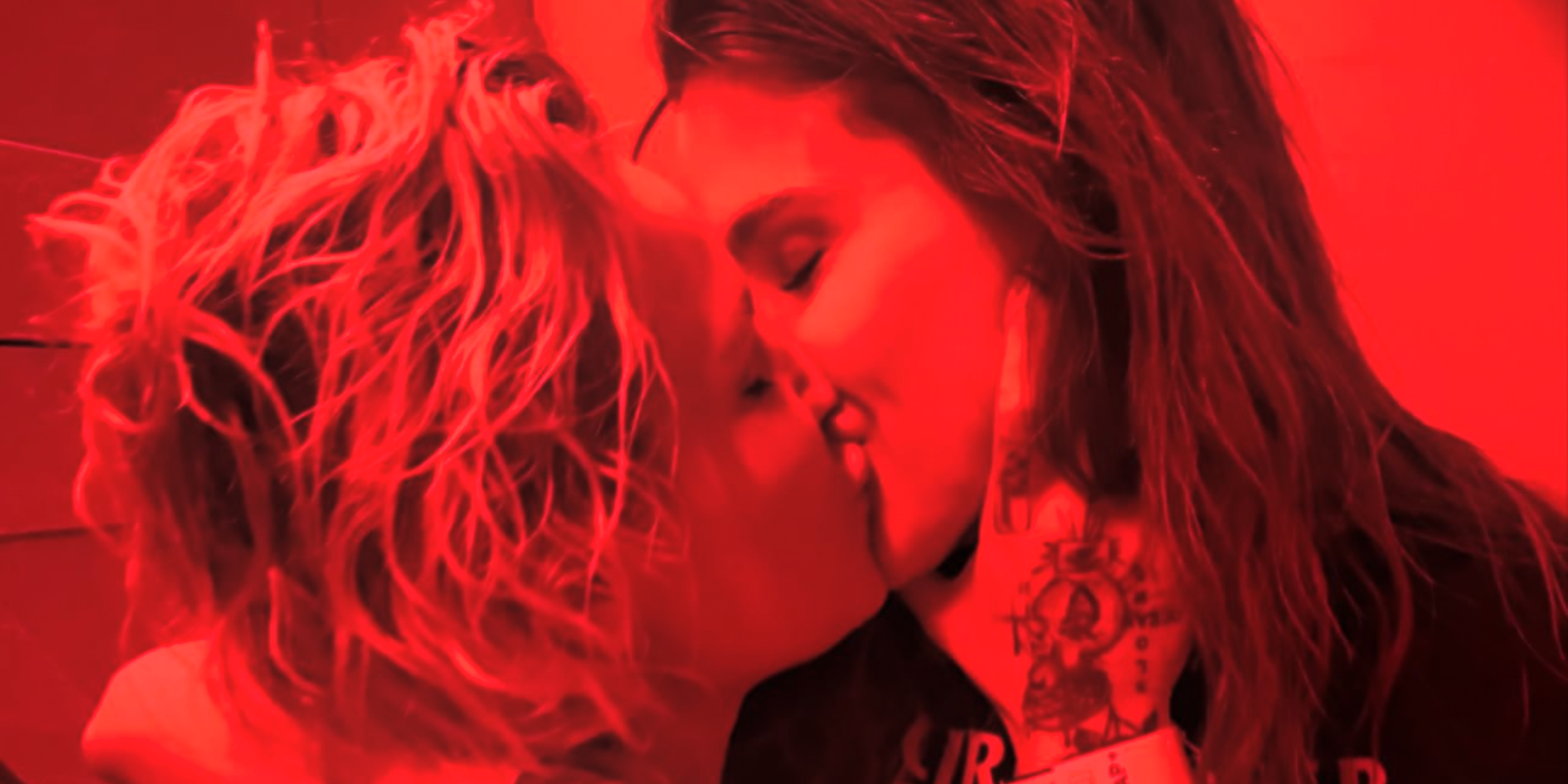 Ashlyn Harris and Sophia Bush making out