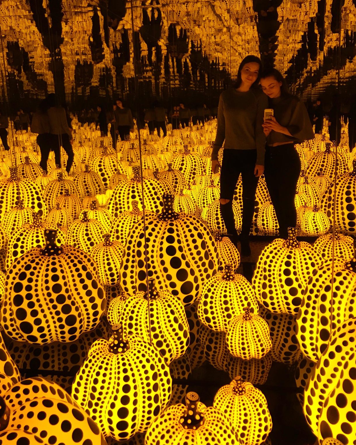 the author in a Yayoi Kusama exhibit
