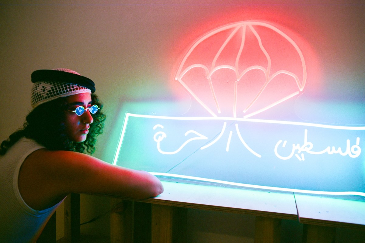 Etaf with a neon sign