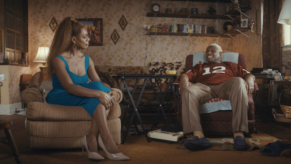 Desiree (Laverne Cox), Henry (George Wallace) sit in a living room