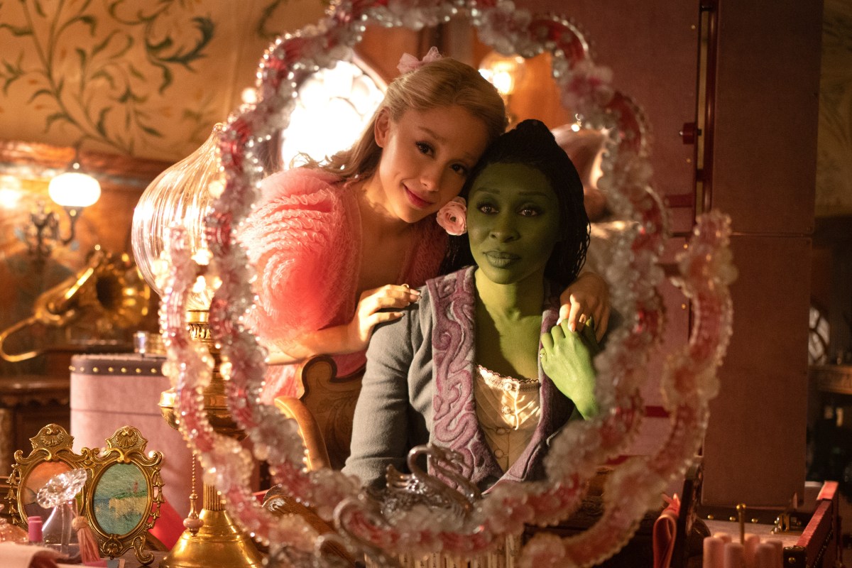 Ariana Grande and Cynthia Erivo in Wicked look into a mirror together
