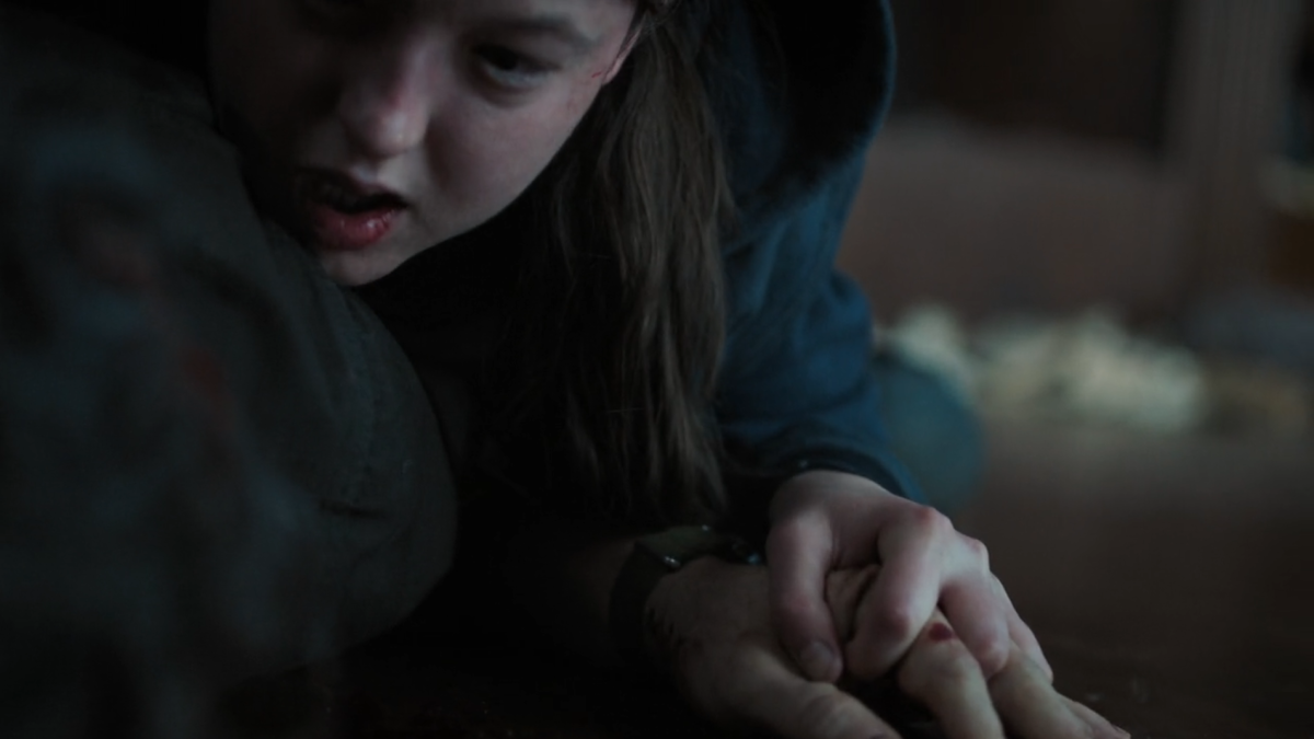 The Last of Us 202-6 ellie holding joel's hand