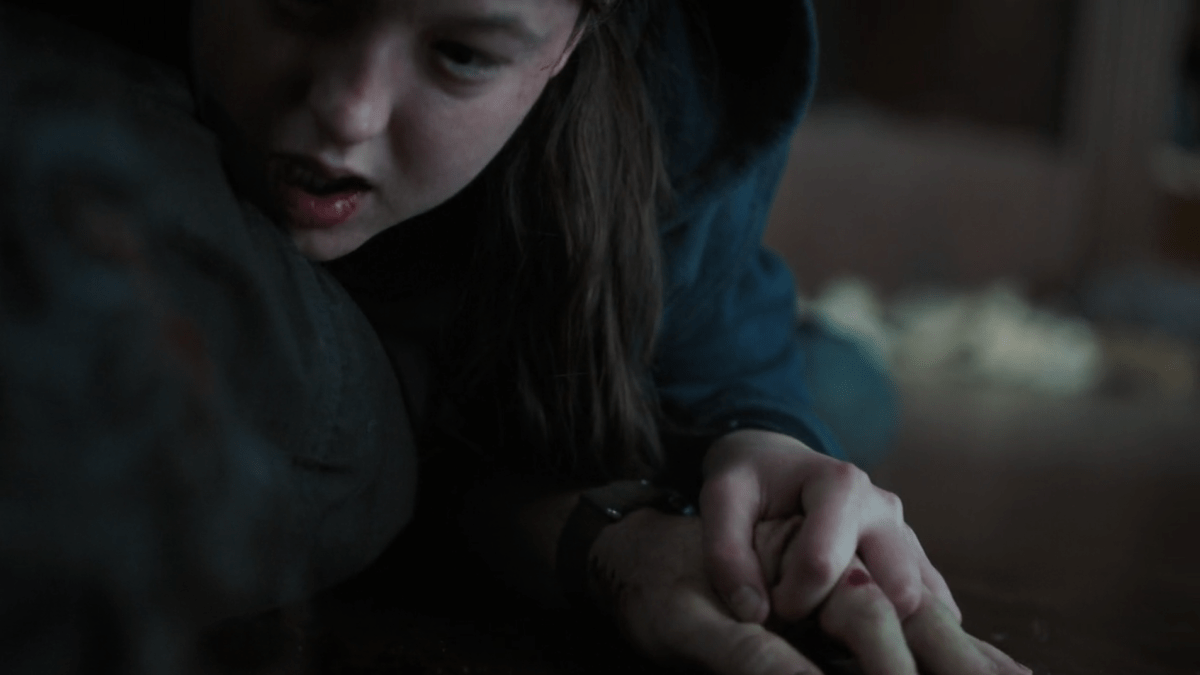 The Last of Us 202-6 ellie holding joel's hand