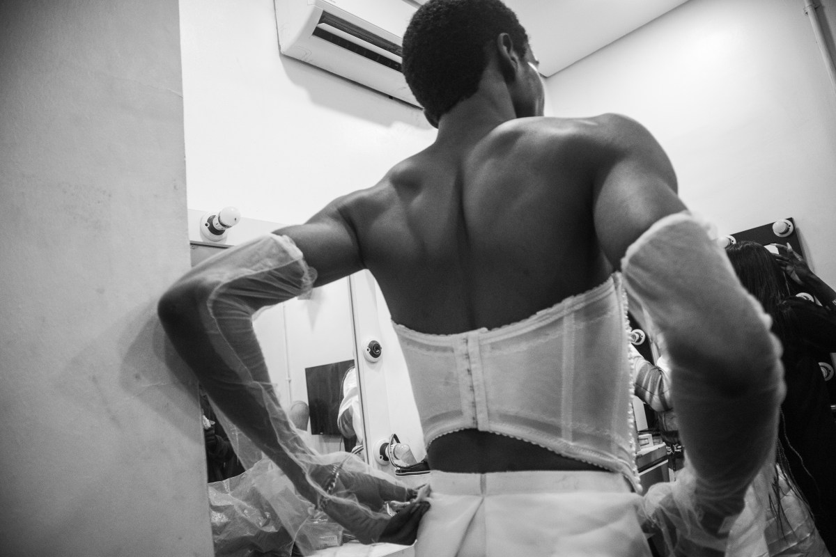 a ballroom perfomer getting ready backstage