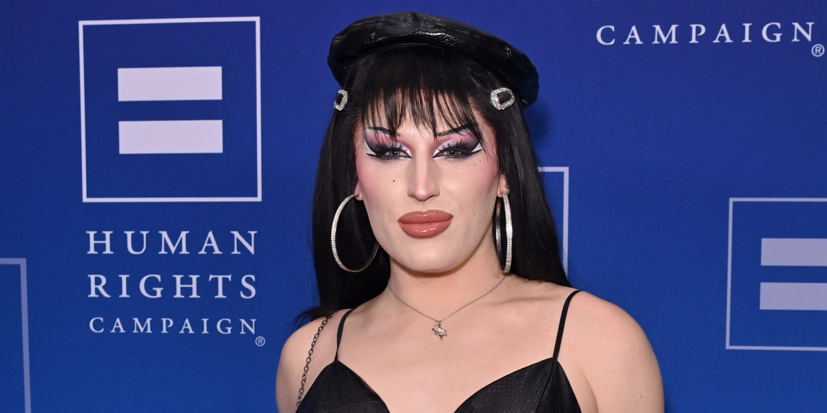Amanda Tori Meating host of Dollapalooza poses at an HRC event.