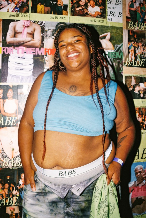 an attendee at the FOR THEM x BABE wine bar event wears BABE underwear