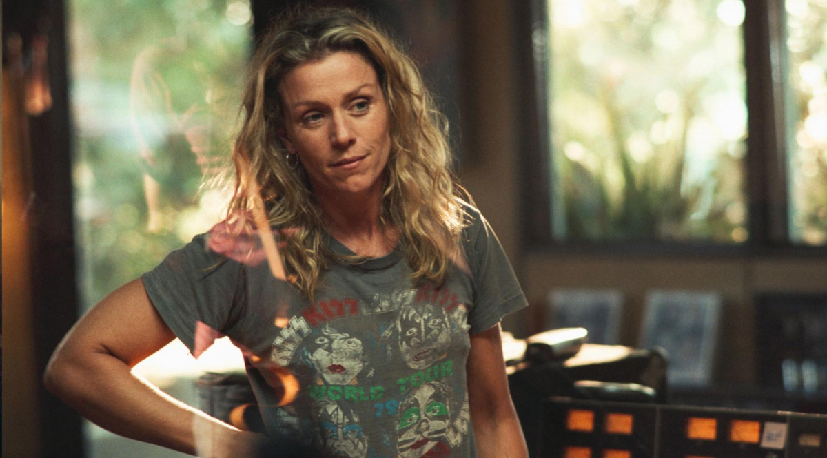 Frances McDormand stands with a hand on her hip in Laurel Canyon