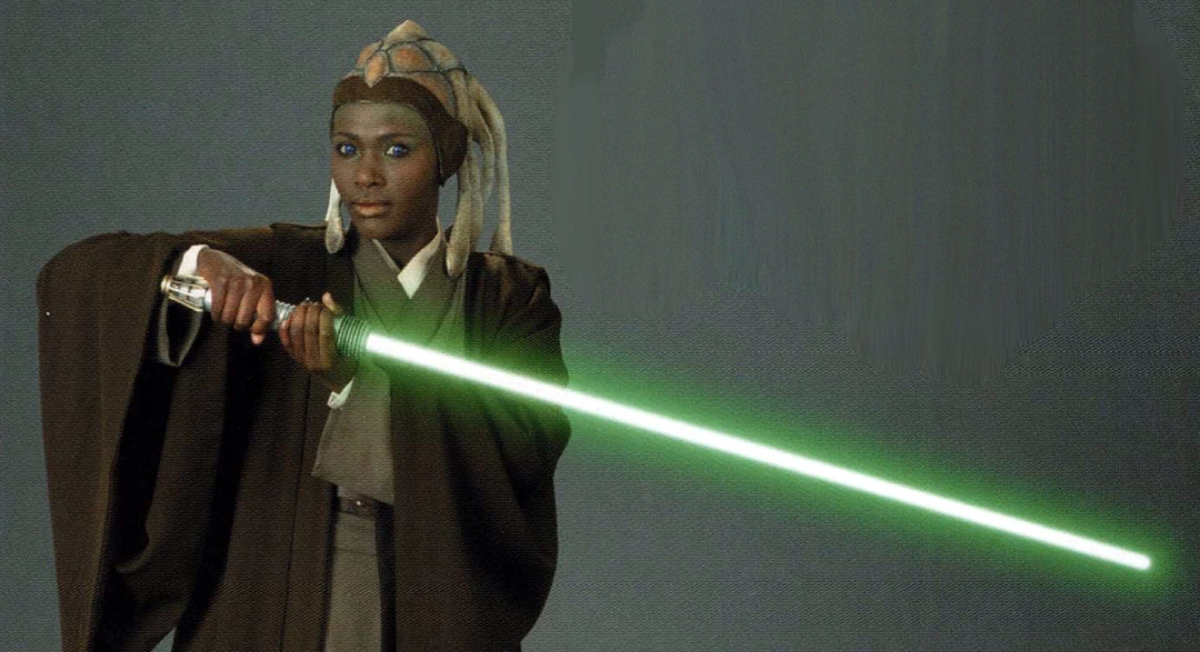 Stass Allie poses with a green light saber for Revenge of the Sith