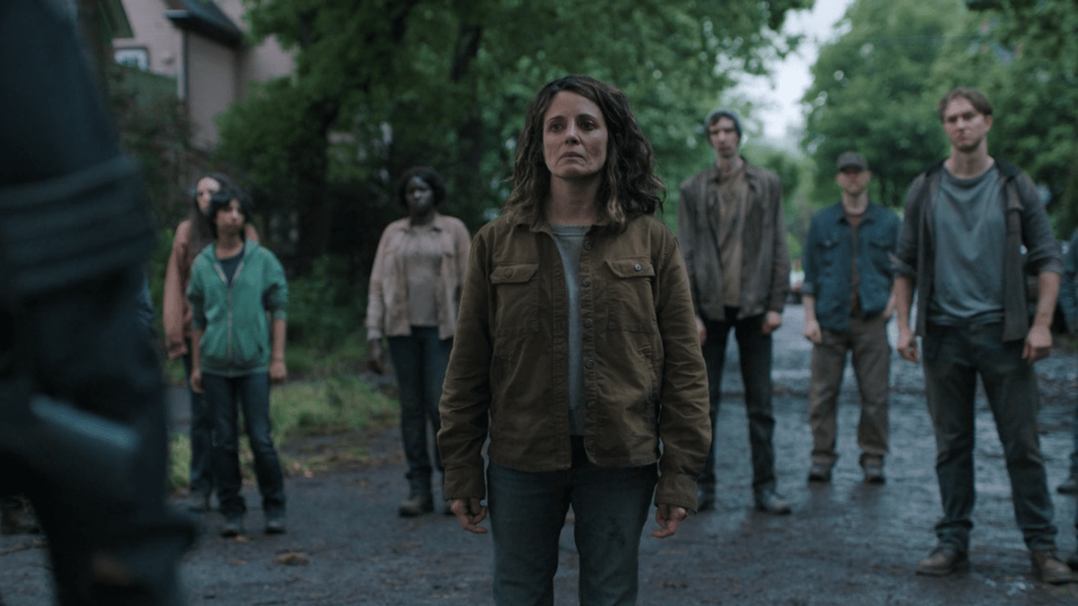 The Last of Us 204: Hanrahan stands with some of her followers waiting for Isaac