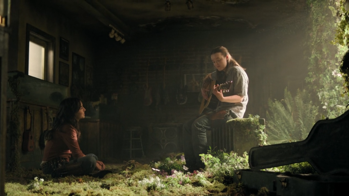 The Last of Us 204: Ellie plays guitar while Dina listens with hearteyes