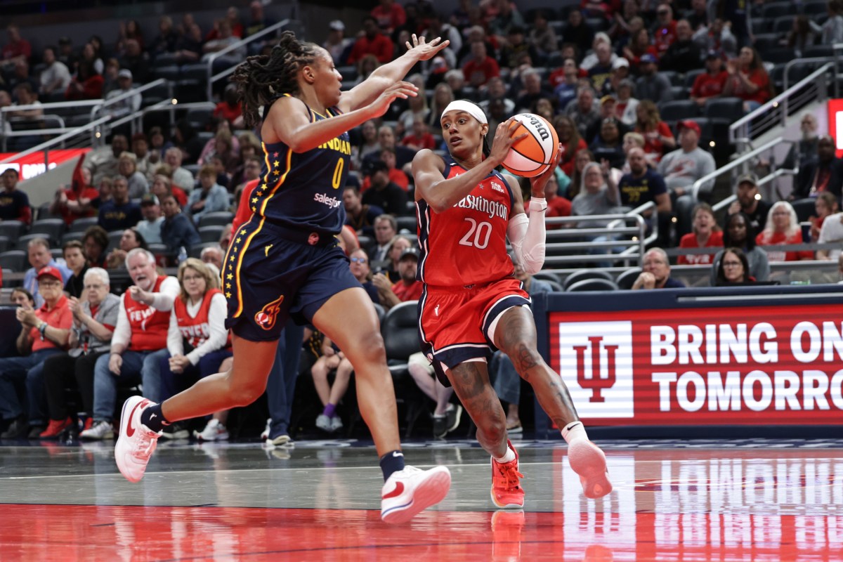 INDIANAPOLIS, INDIANA - MAY 3: Brittney Sykes #20 of the Washington Mystics dribbles past Kelsey Mitchell #0 of the Indiana Fever during the first half at Gainbridge Fieldhouse on May 3, 2025 in Indianapolis, Indiana. NOTE TO USER: User expressly acknowledges and agrees that, by downloading and or using this photograph, User is consenting to the terms and conditions of the Getty Images License Agreement. (Photo by Geoff Stellfox/Getty Images)