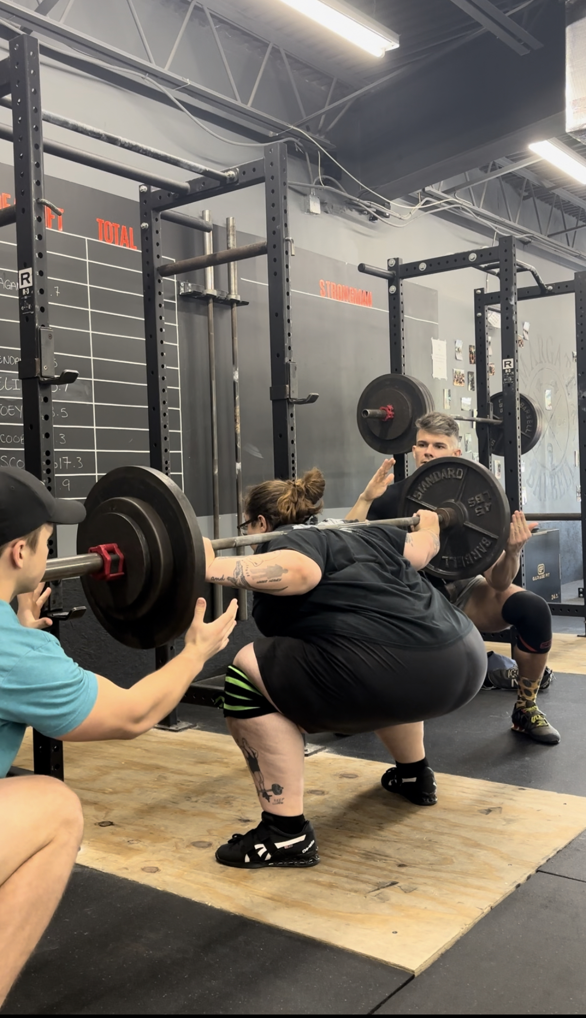 Stef barbell squatting