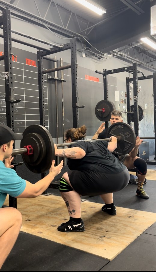 Stef barbell squatting