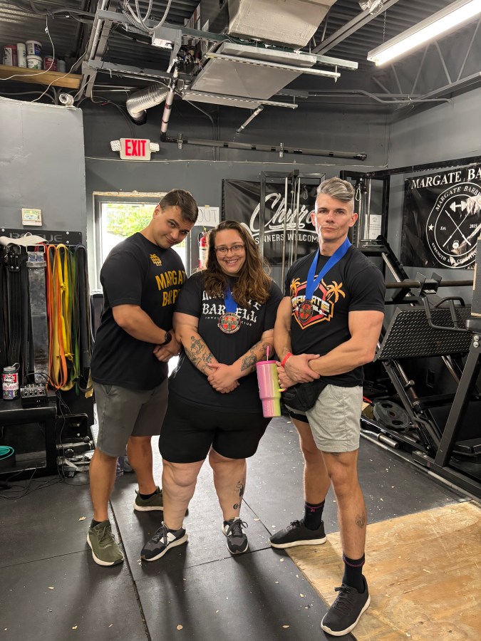Stef and their gym family