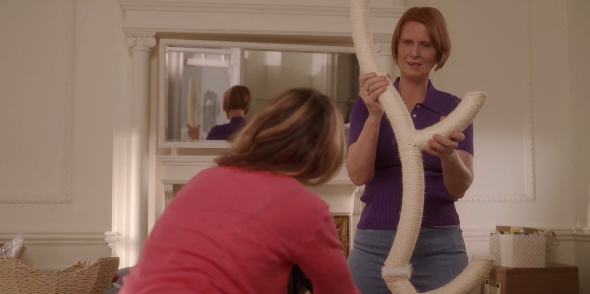 Miranda holding a cat gym