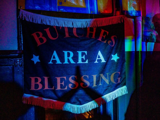 a hanging sign that says butches are a blessing