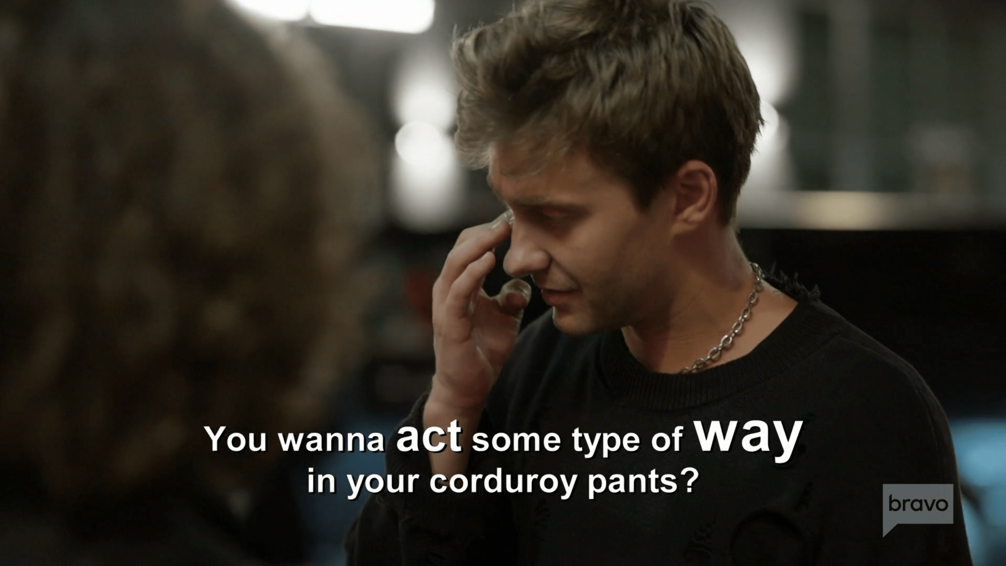 Charlie in Next Gen NYC as someone says You wanna act some type of way in your corduroy pants.